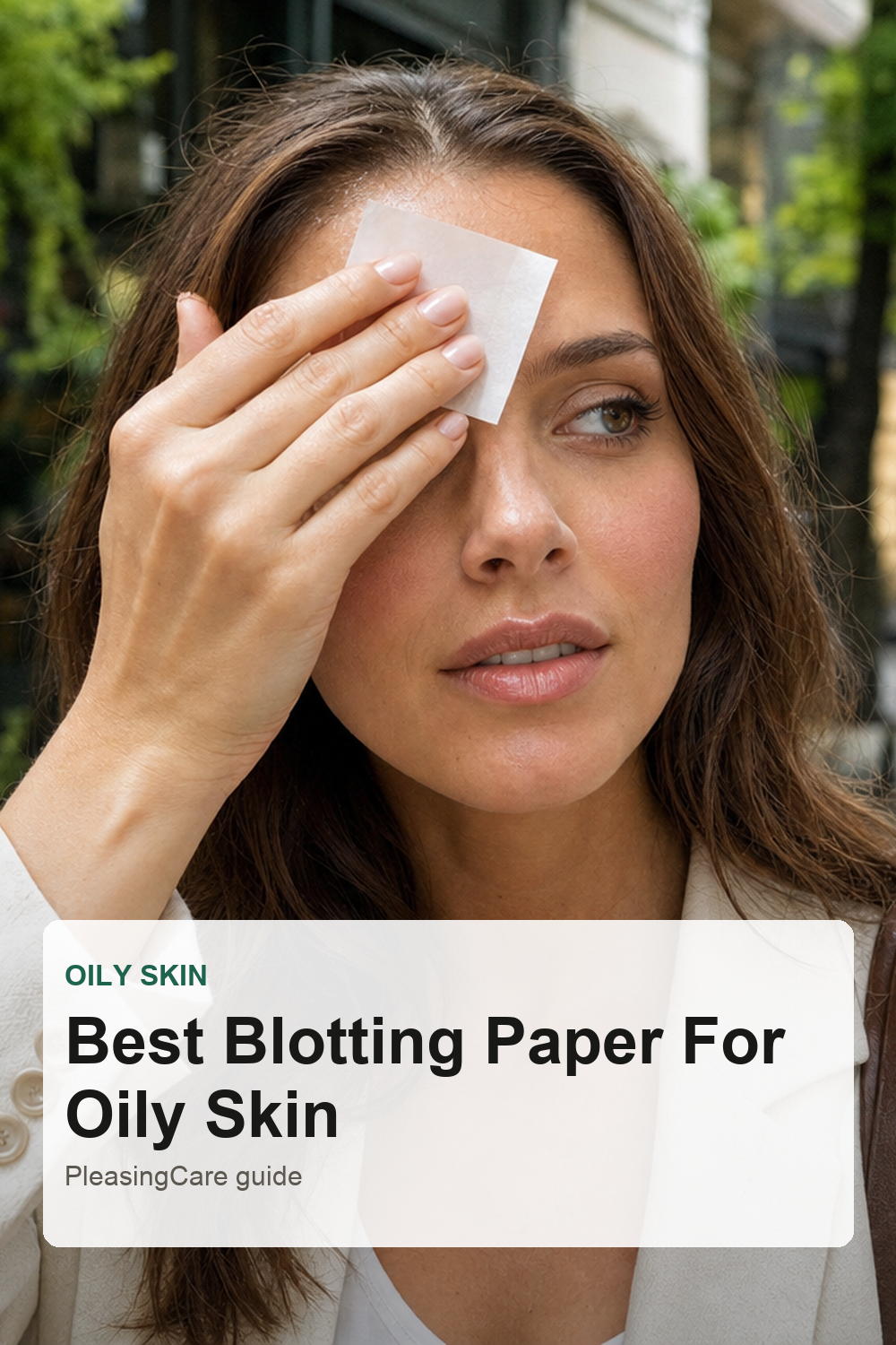Woman using blotting paper for oily skin shine control
